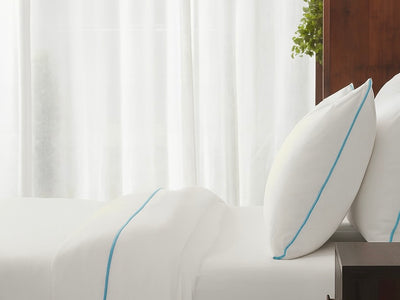 White with Sky Blue Piping